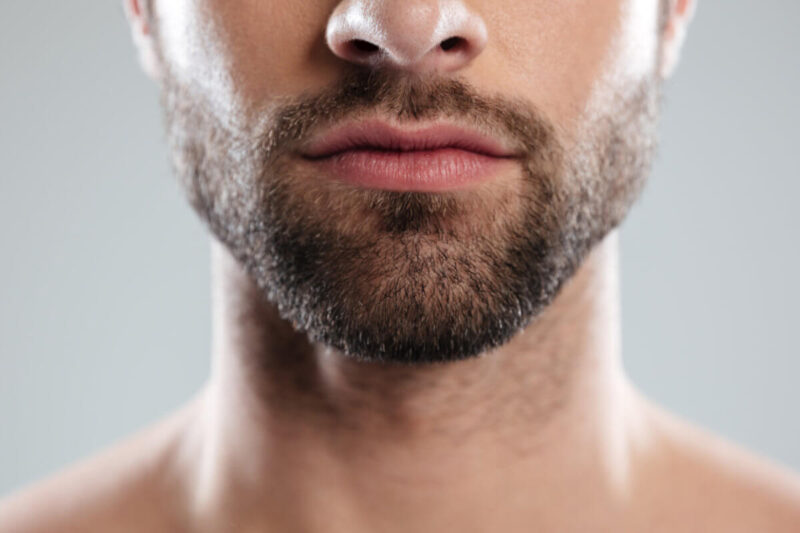 Gay Blowjob. Blowjob unter Männern. Blojob between men. Symbolbild: Mund eines bärtigen Mannes. Symbolic image: Mouth of a bearded man.